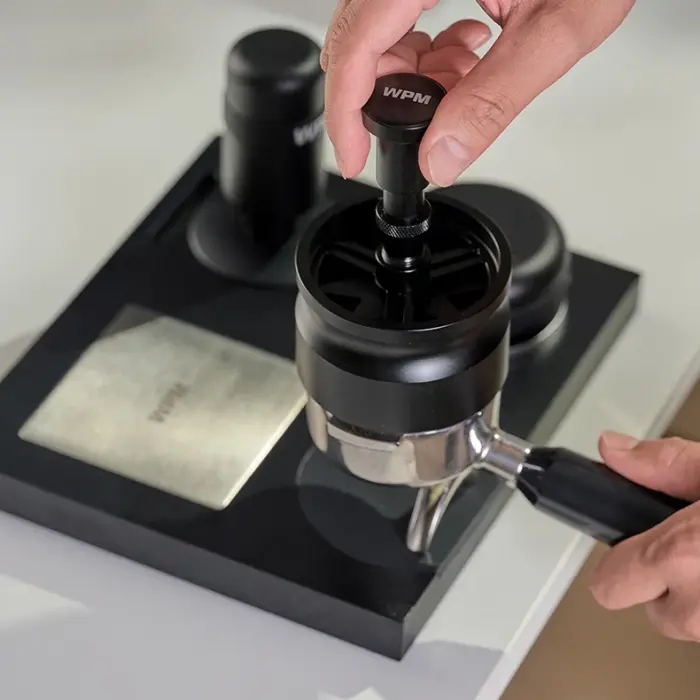 Dụng cụ phân bổ cà phê xoay
